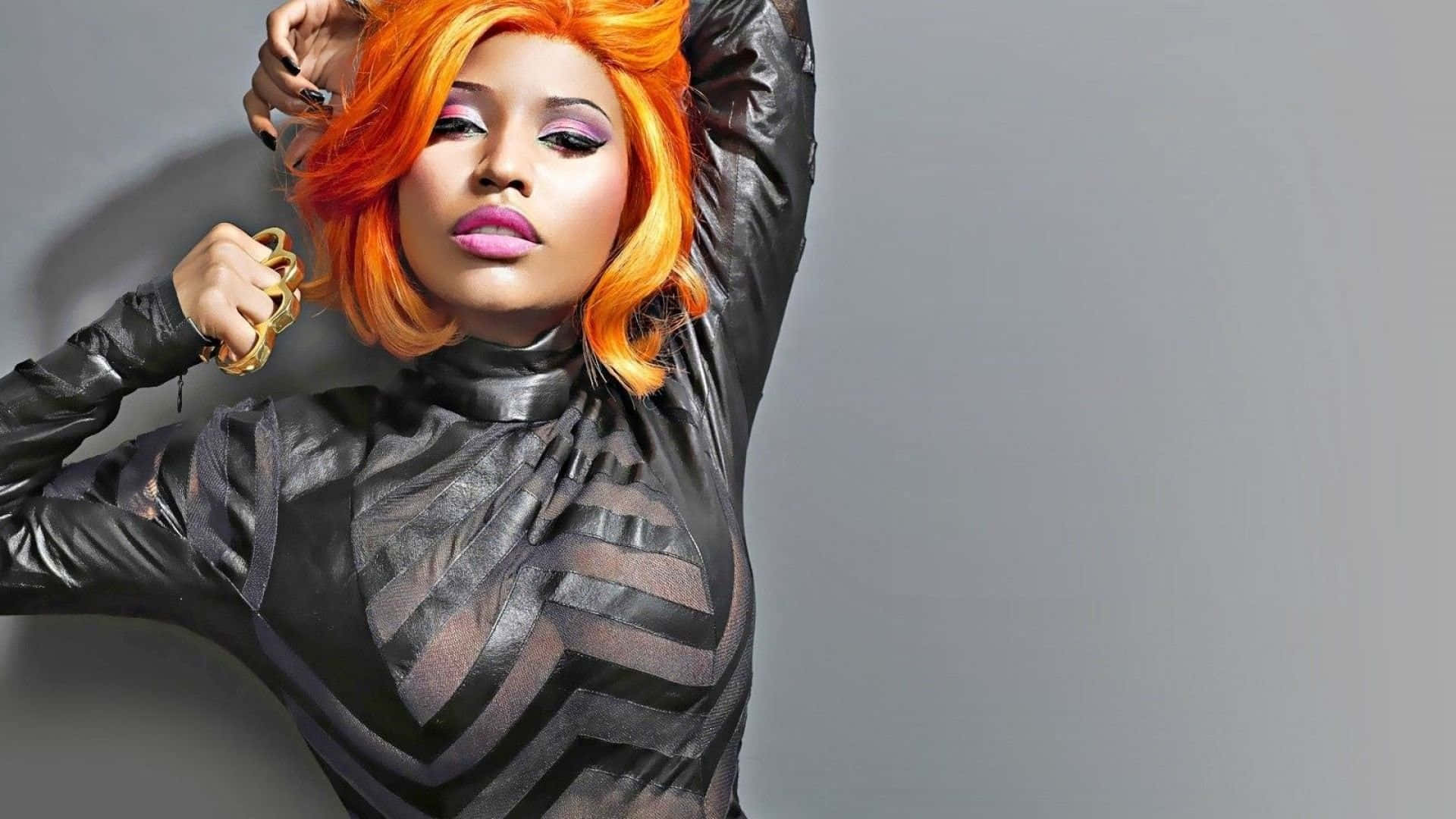 Nicki Minaj striking a pose on stage