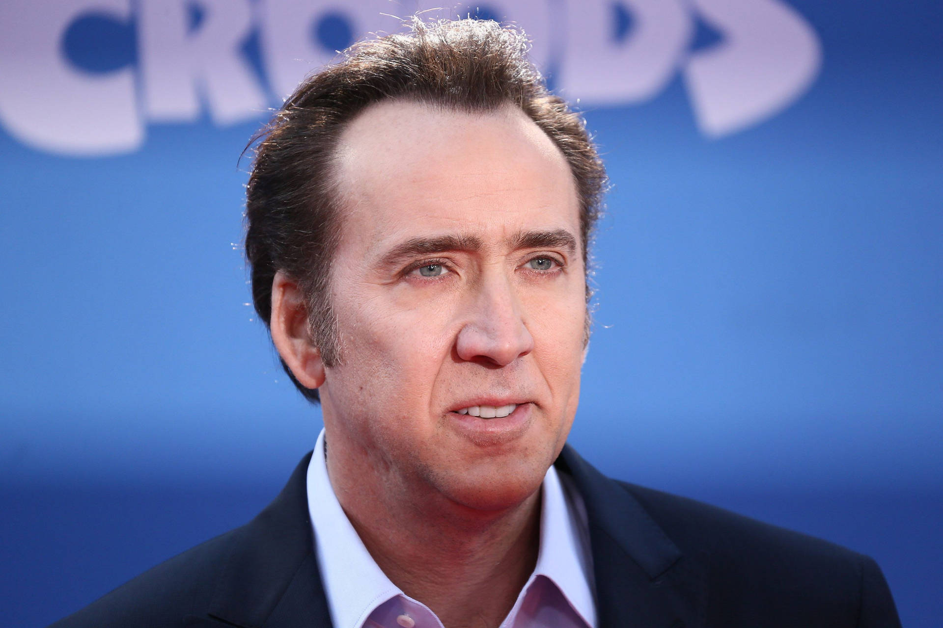 Nicolas Cage Blue Background