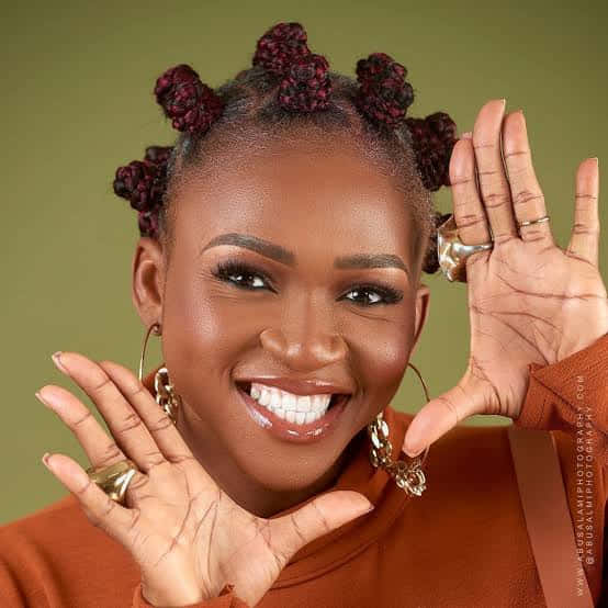 Nigerian Woman Emphasizing Smile Wallpaper