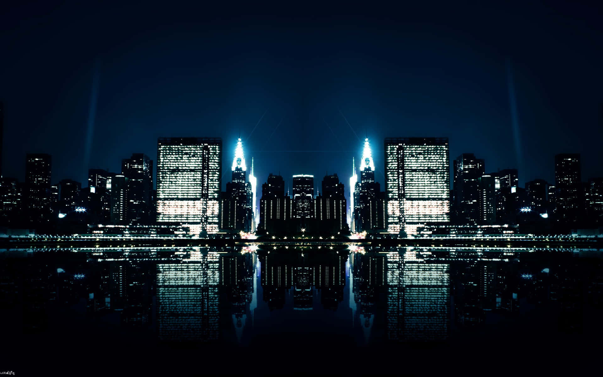 A Cityscape With Buildings Lit Up At Night
