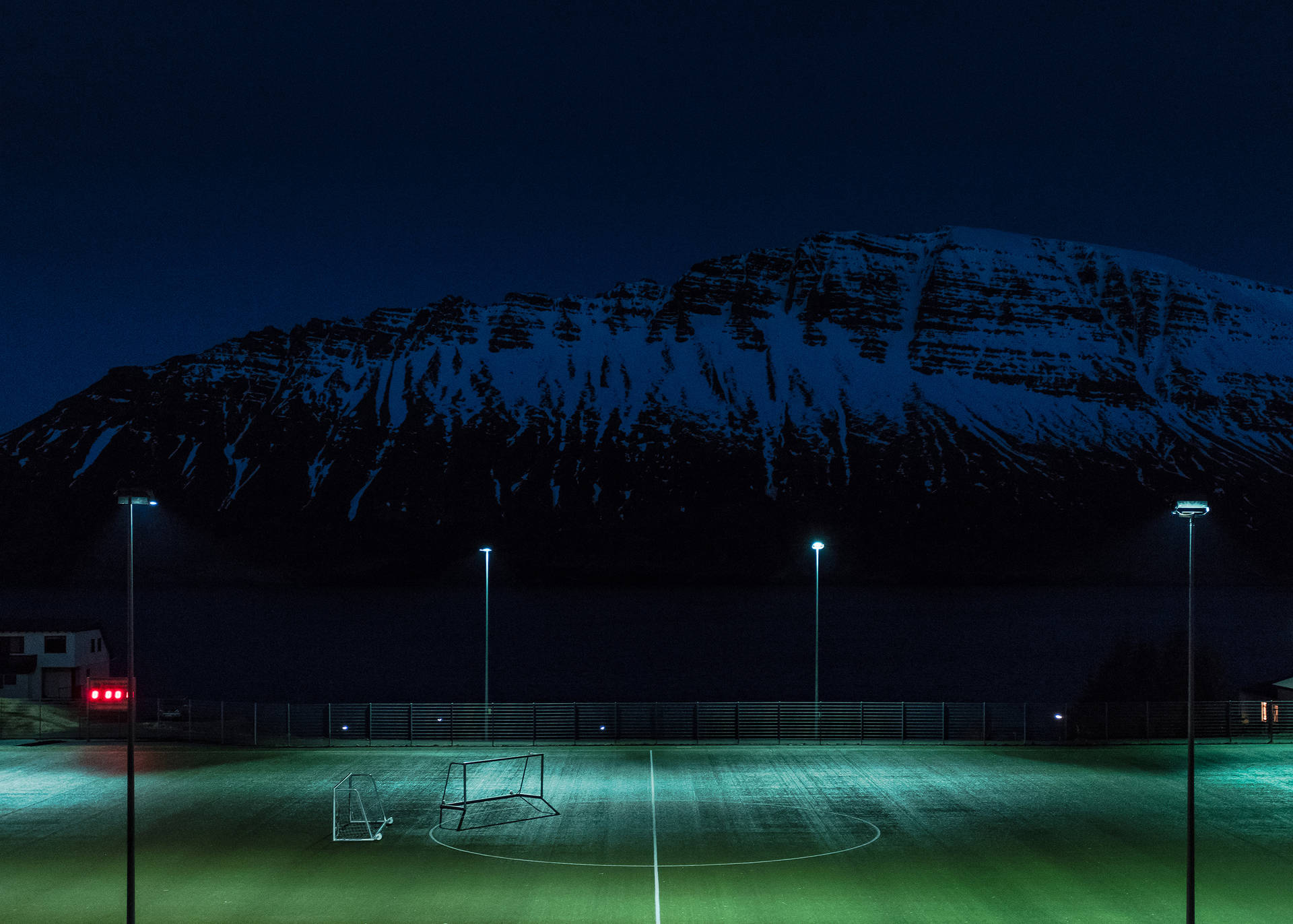Illuminated night football field ready for the game. Wallpaper