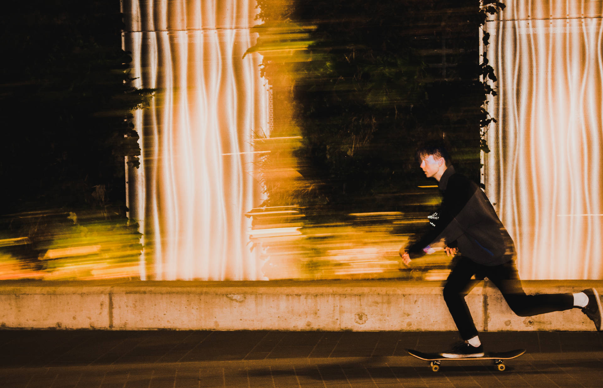 Taking a night time skateboard stroll. Wallpaper