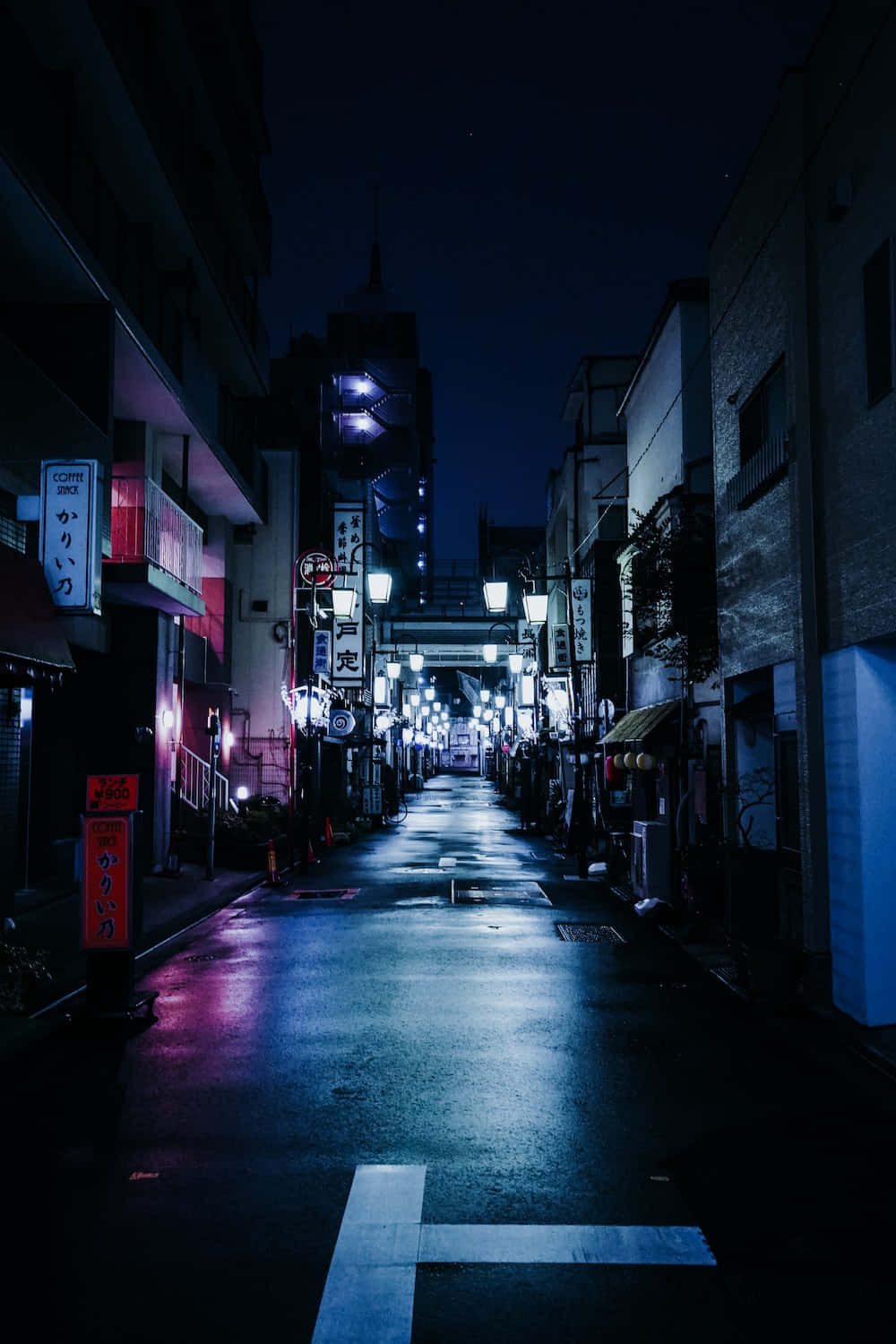 Taking a Quiet Walk Down the Street at Night