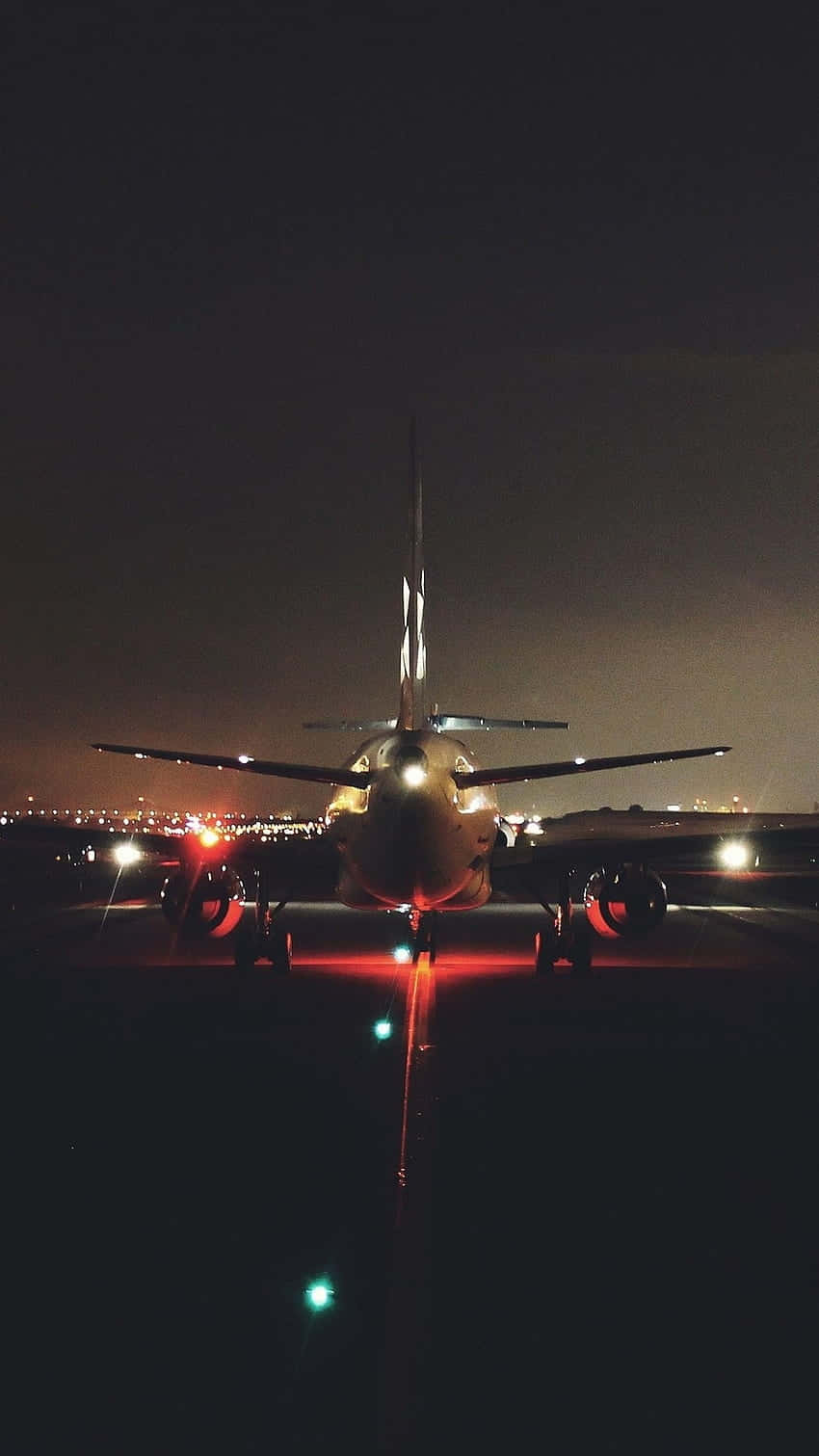 Nighttime Airplane Runway Illumination Wallpaper