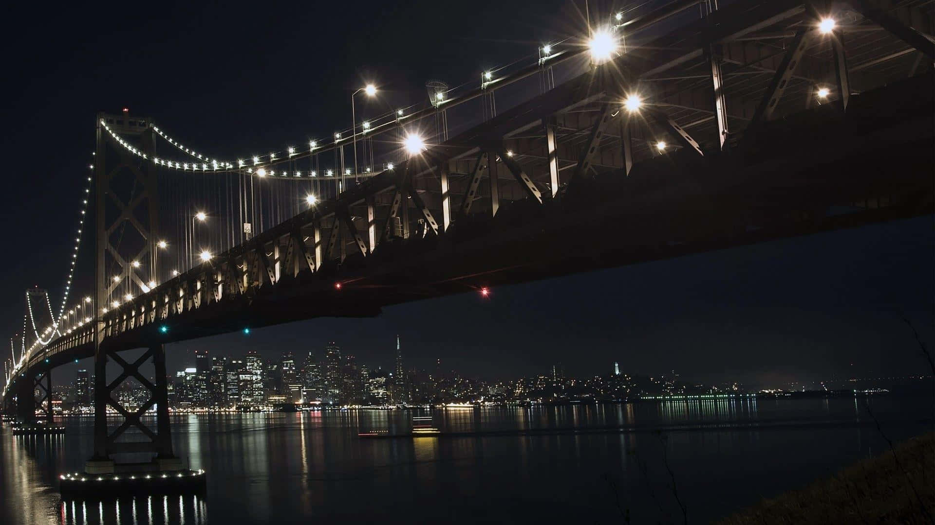 Nighttime Cityscape Bridge Illumination Wallpaper