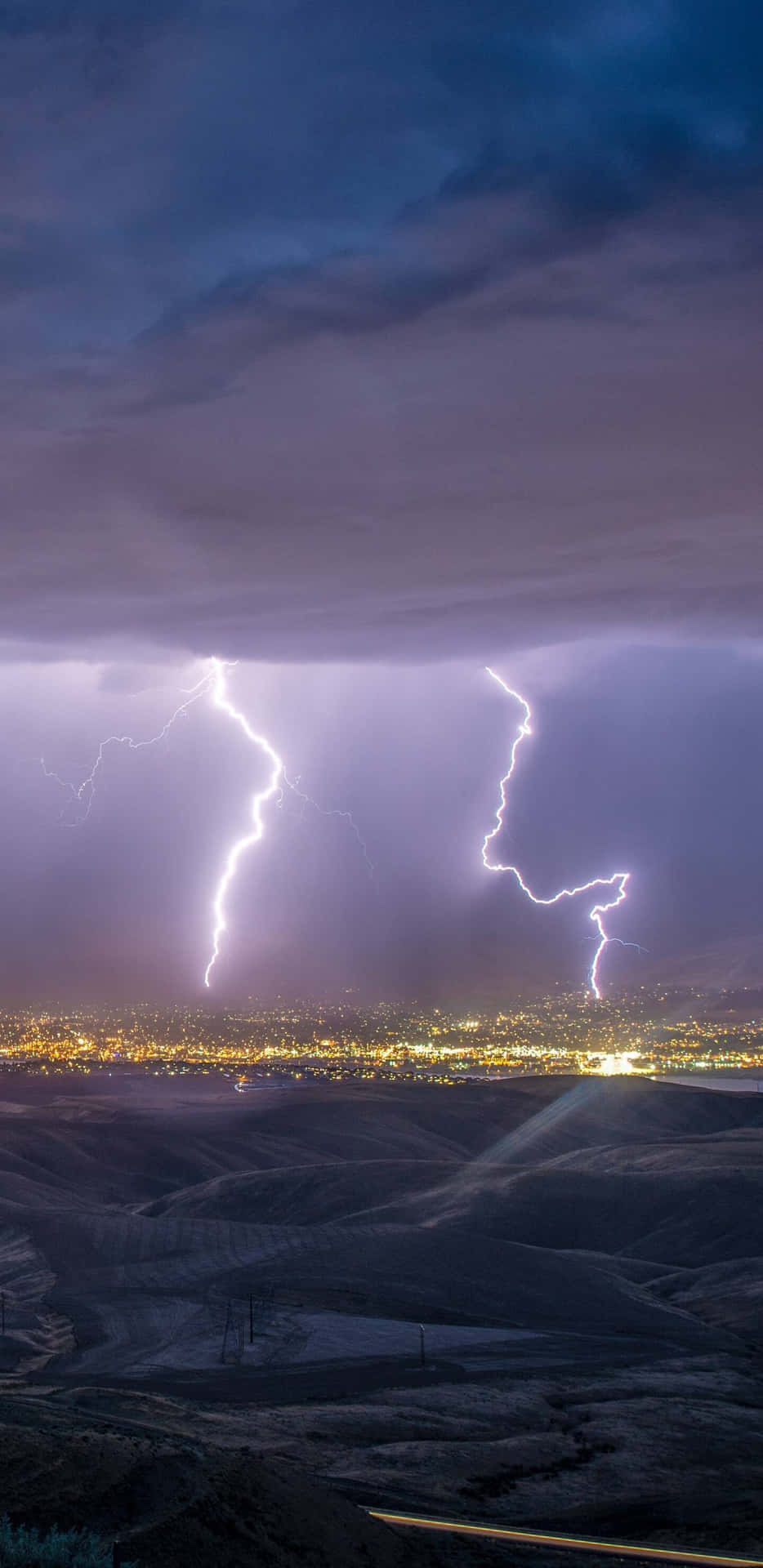 Nighttime Lightning Strike Over City Wallpaper