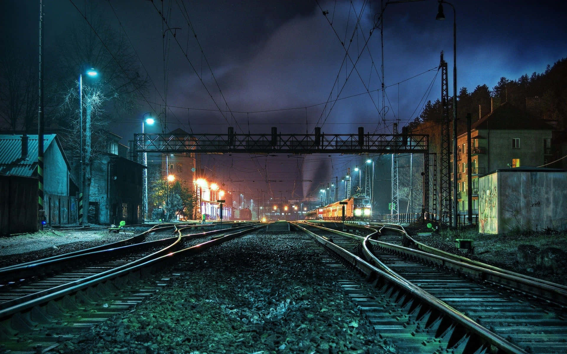 Nighttime Railway Station Scenery Wallpaper