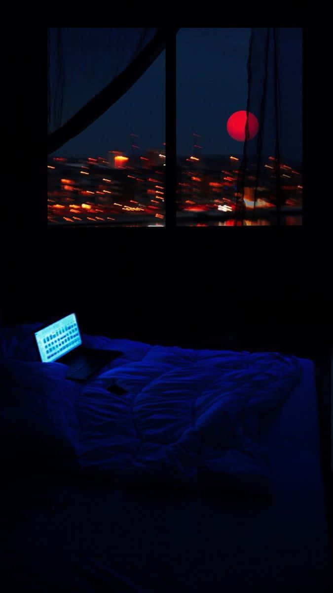 Nighttime Urban Glow Bedroom Scene Wallpaper