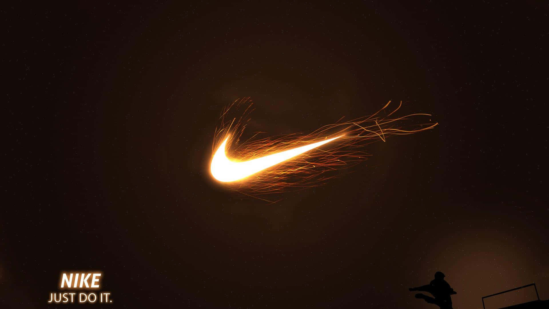 Logoda Nike No Escuro Com Uma Pessoa Em Pé Em Cima Dela.