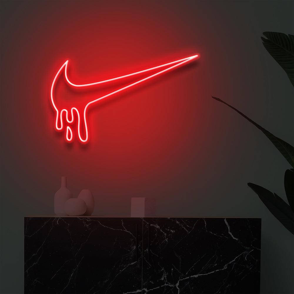 Nike Drip Logo for The Swoosh Brand Wallpaper