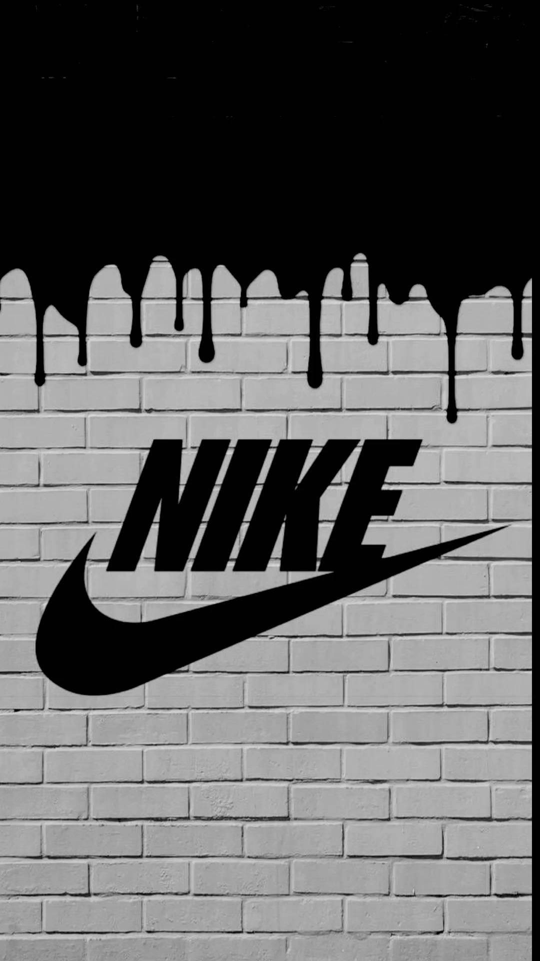 Nikedrip Logotyp I Svart På Murverk Wallpaper