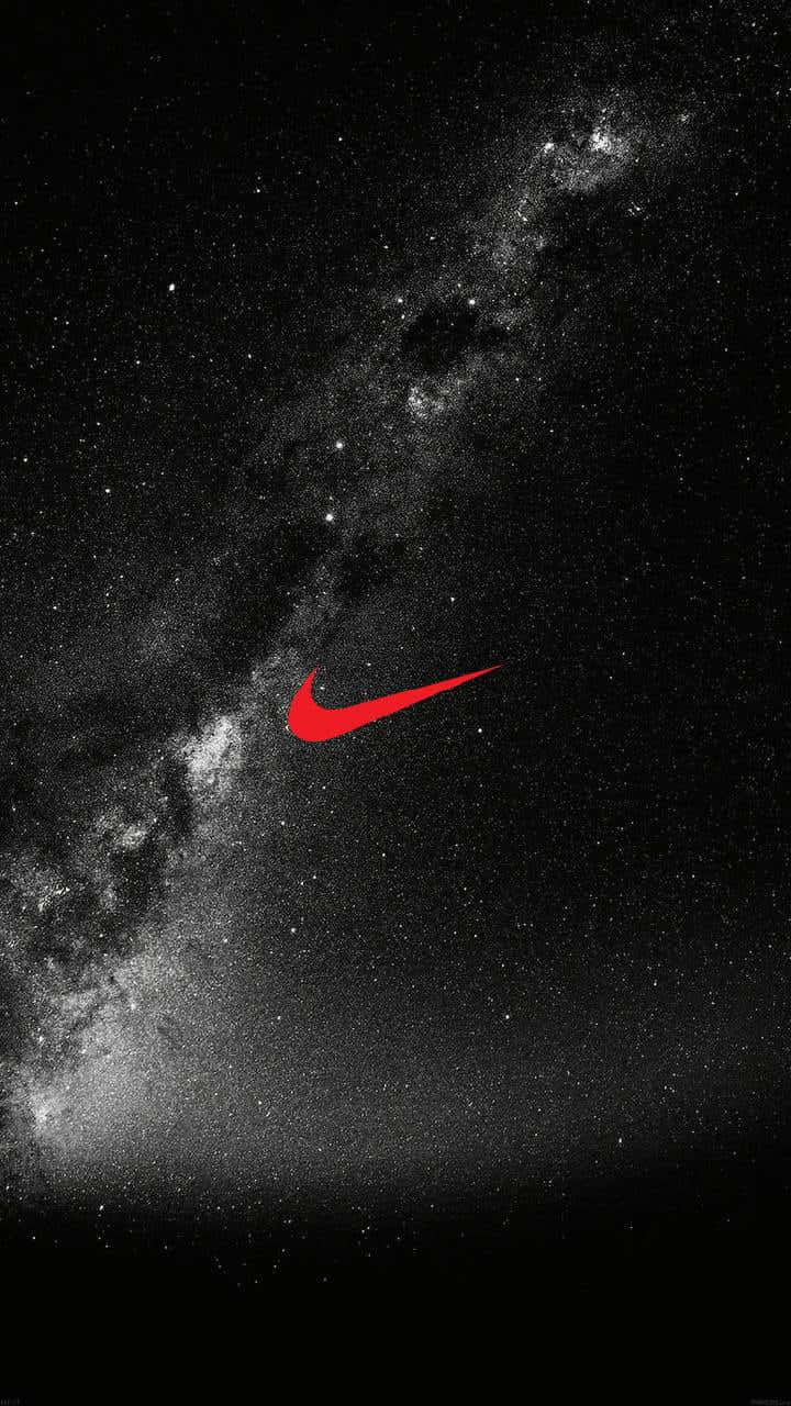 Et Nike logo på himlen med en rød baggrund. Wallpaper