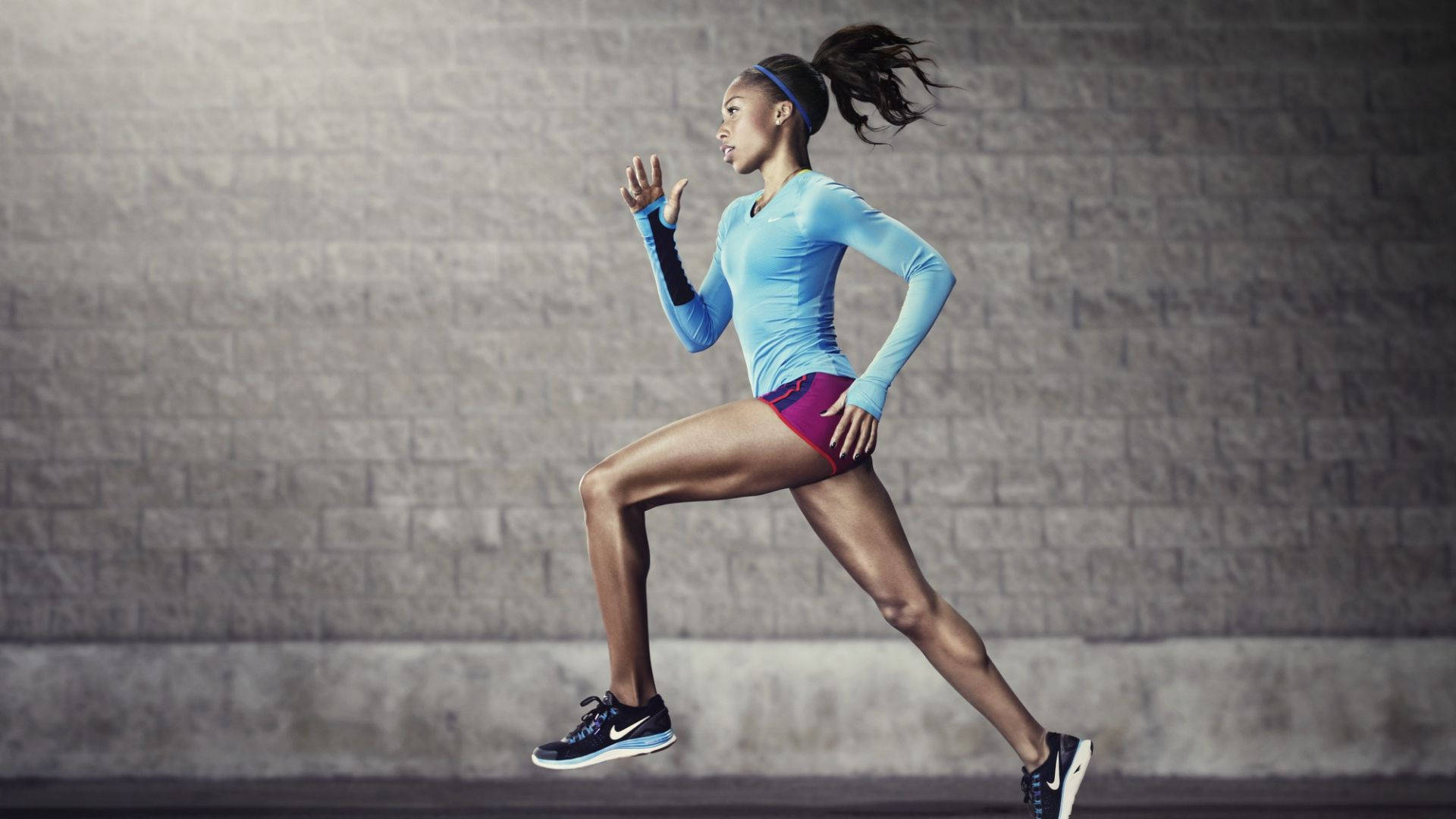 Nike Girl Athlete Running Wallpaper