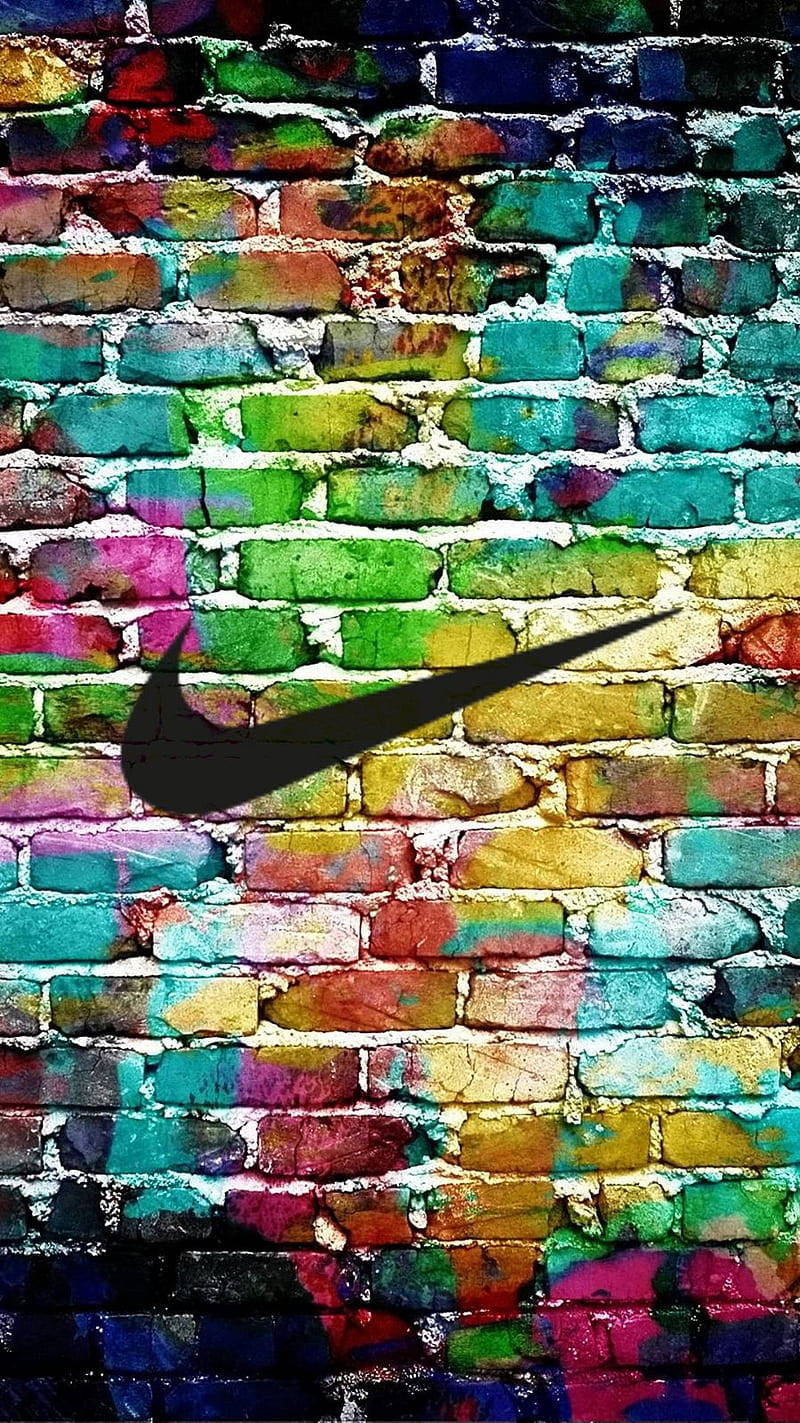 Läggtill Stil Och Attityd I Din Look Med Nike Graffiti Wallpaper