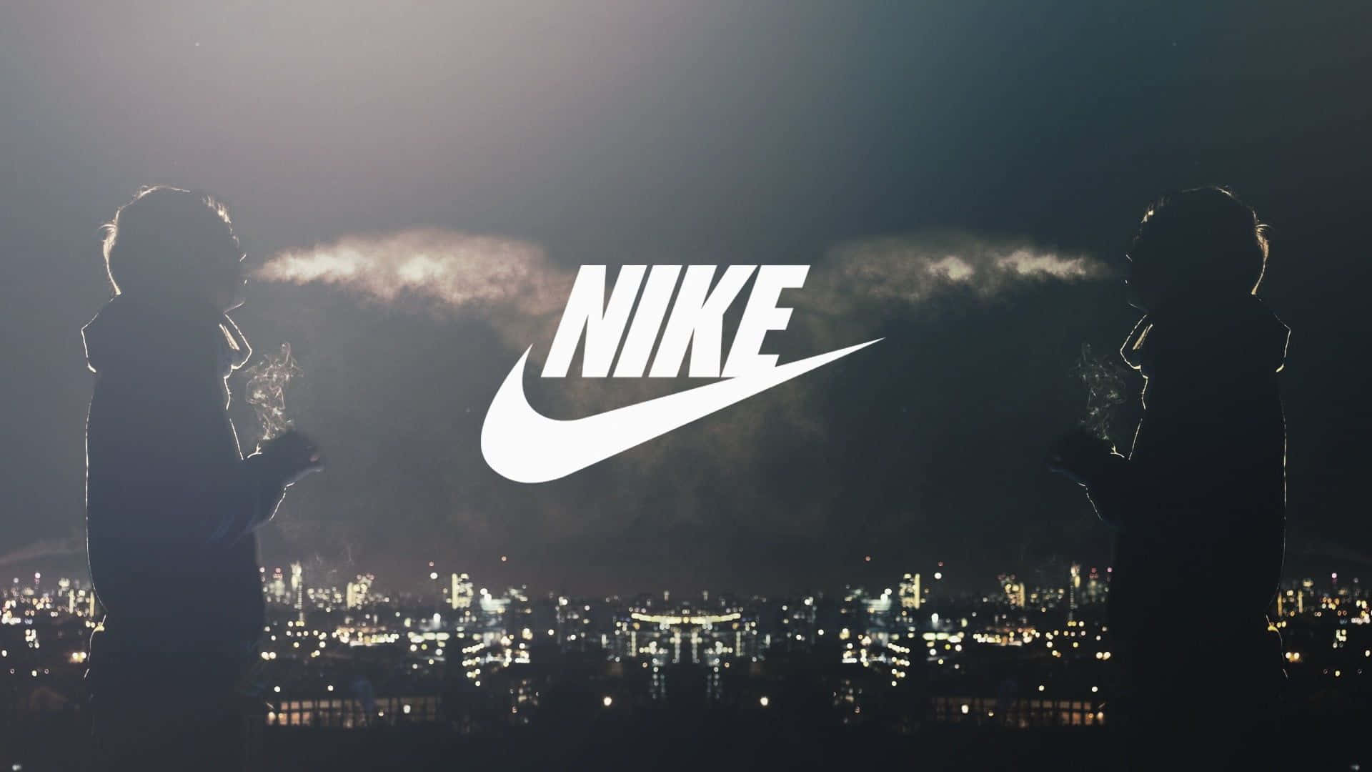 Nike Røg Logo Tapet: Nyt farveglædende tapet med Nikes ikoniske logo. Wallpaper
