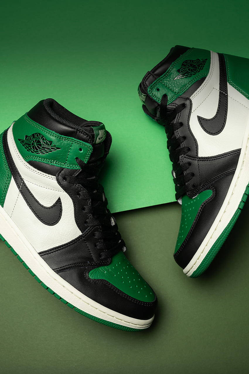 Stand Out with Nike Air Jordan 1 Green Wallpaper