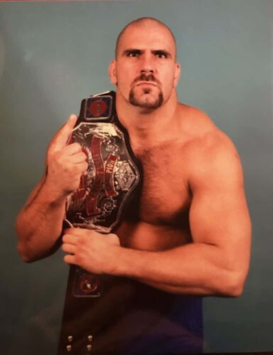 Nikita Koloff With His Belt On Shoulder Wallpaper