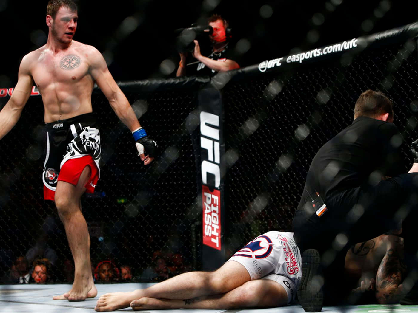 (based On Context, This Could Be A Potential Title For A Computer Or Mobile Wallpaper Featuring An Image Of Nikita Krylov Walking Away From The Viewer.) Wallpaper