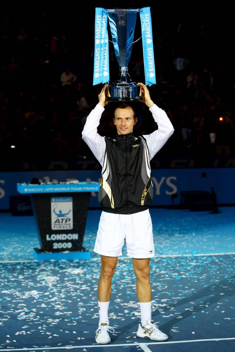 Nikolay Davydenko stiger ATP Trophy Tapet: Wallpaper