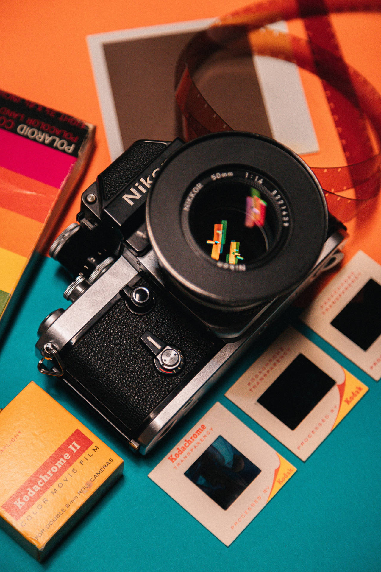 Nikon Dslr Camera And Polaroids Wallpaper