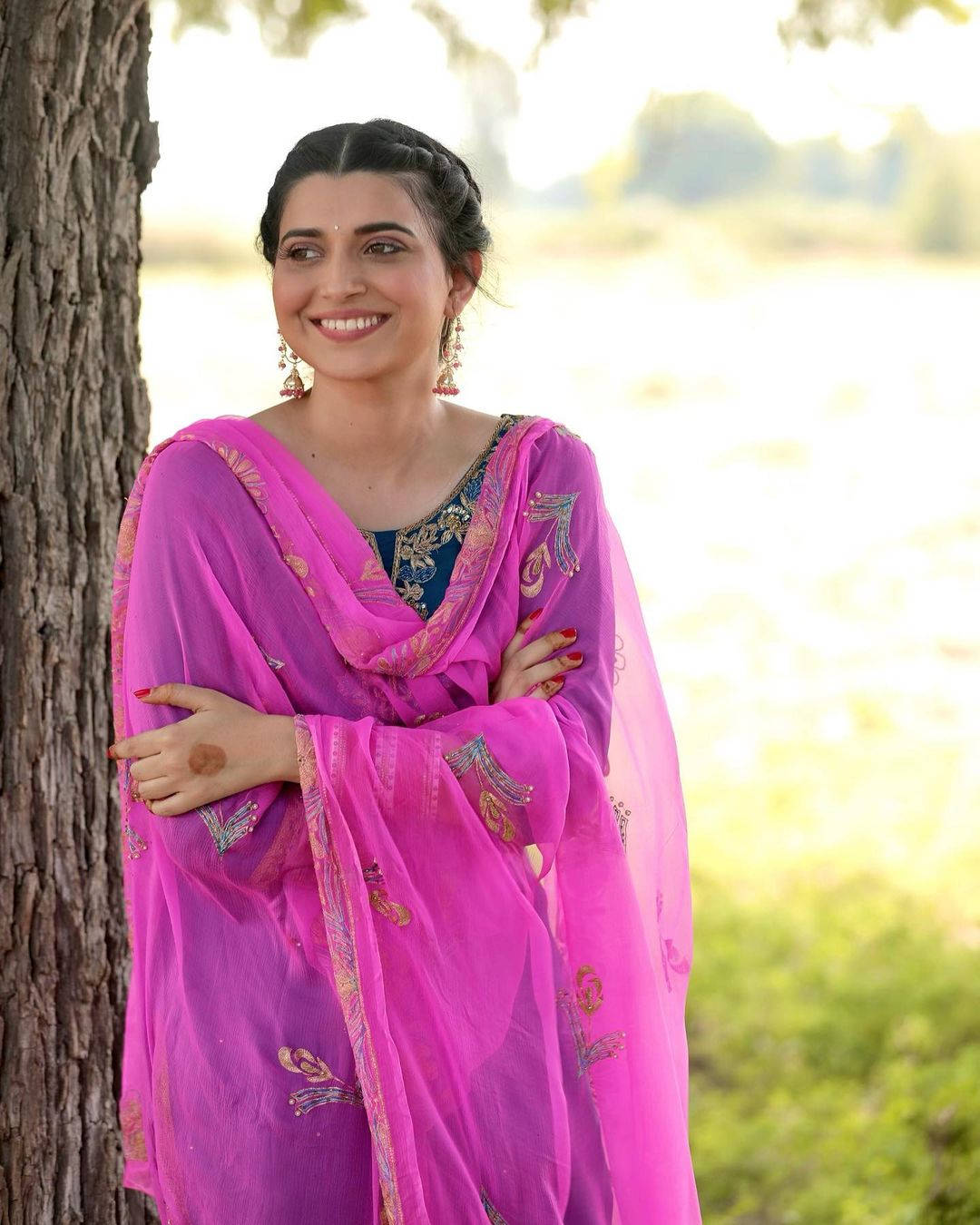 Caption: Nimrat Khaira radiates elegance in a pink shawl Wallpaper