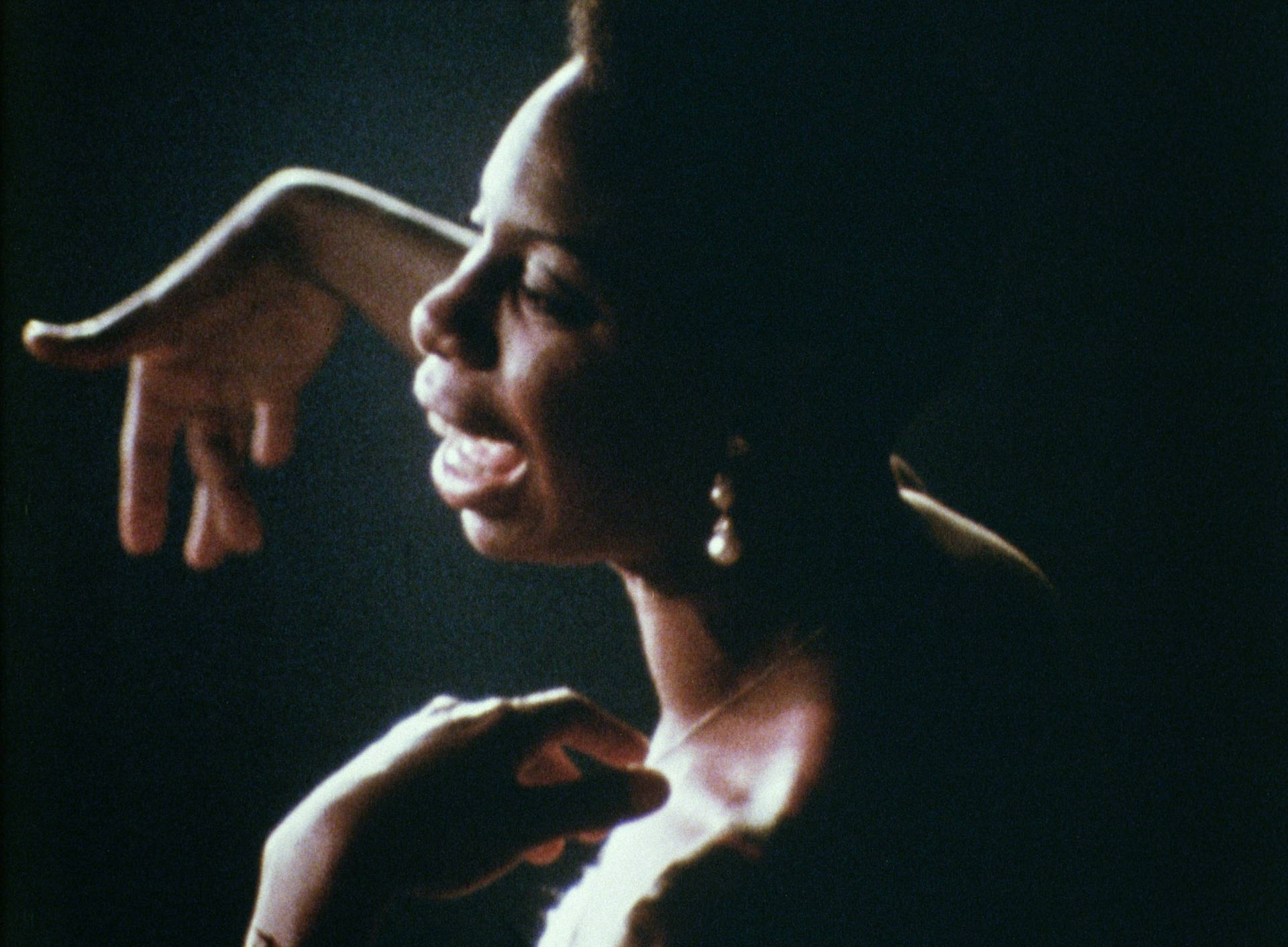 Nina Simone American Singer Powerful Performance Wallpaper