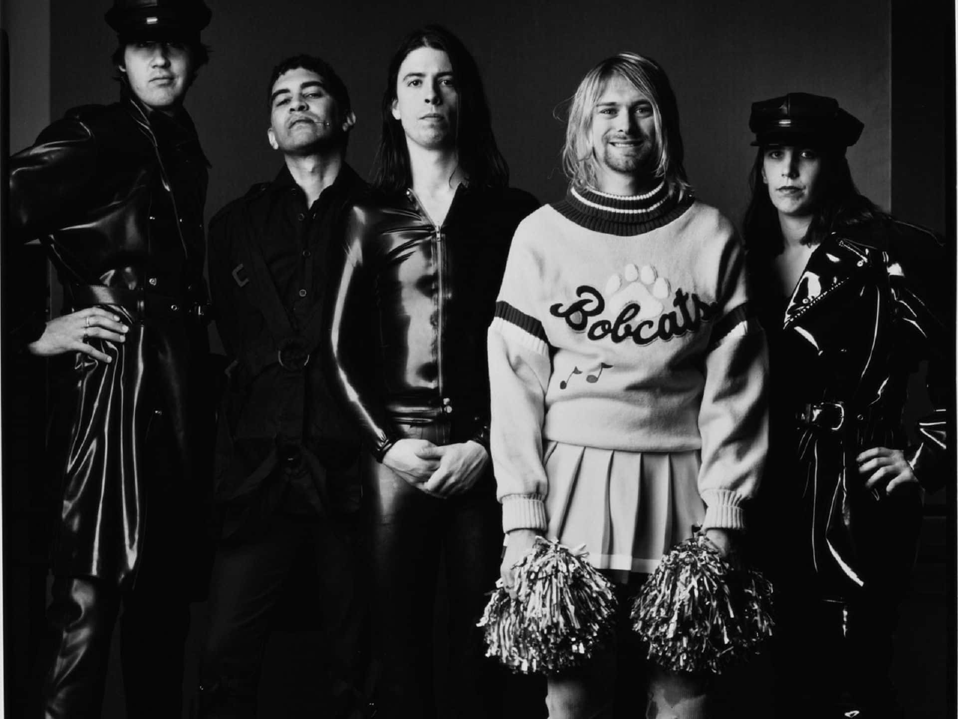 Caption: Grunge Pioneers - Nirvana Rocking the Stage