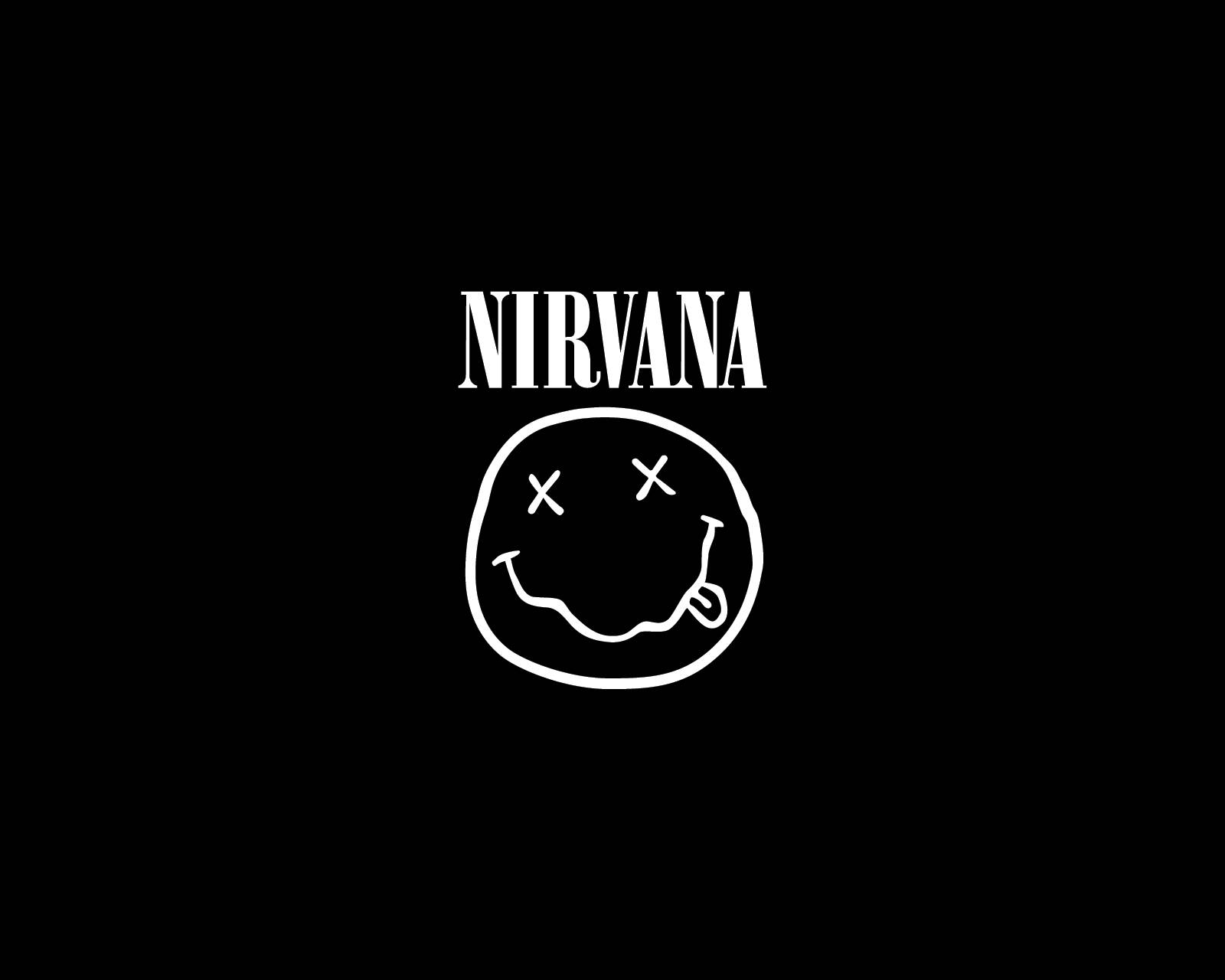 Nirvana 4K Smiley Logo Tapet: Dette realistiske 4K-tapet viser en smilende Nirvana-logo mod en skygget baggrund. Wallpaper