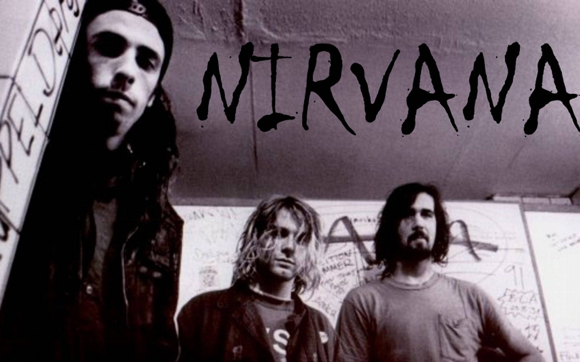 Nirvana Lead Vocalist And Drum Kit Members Wallpaper