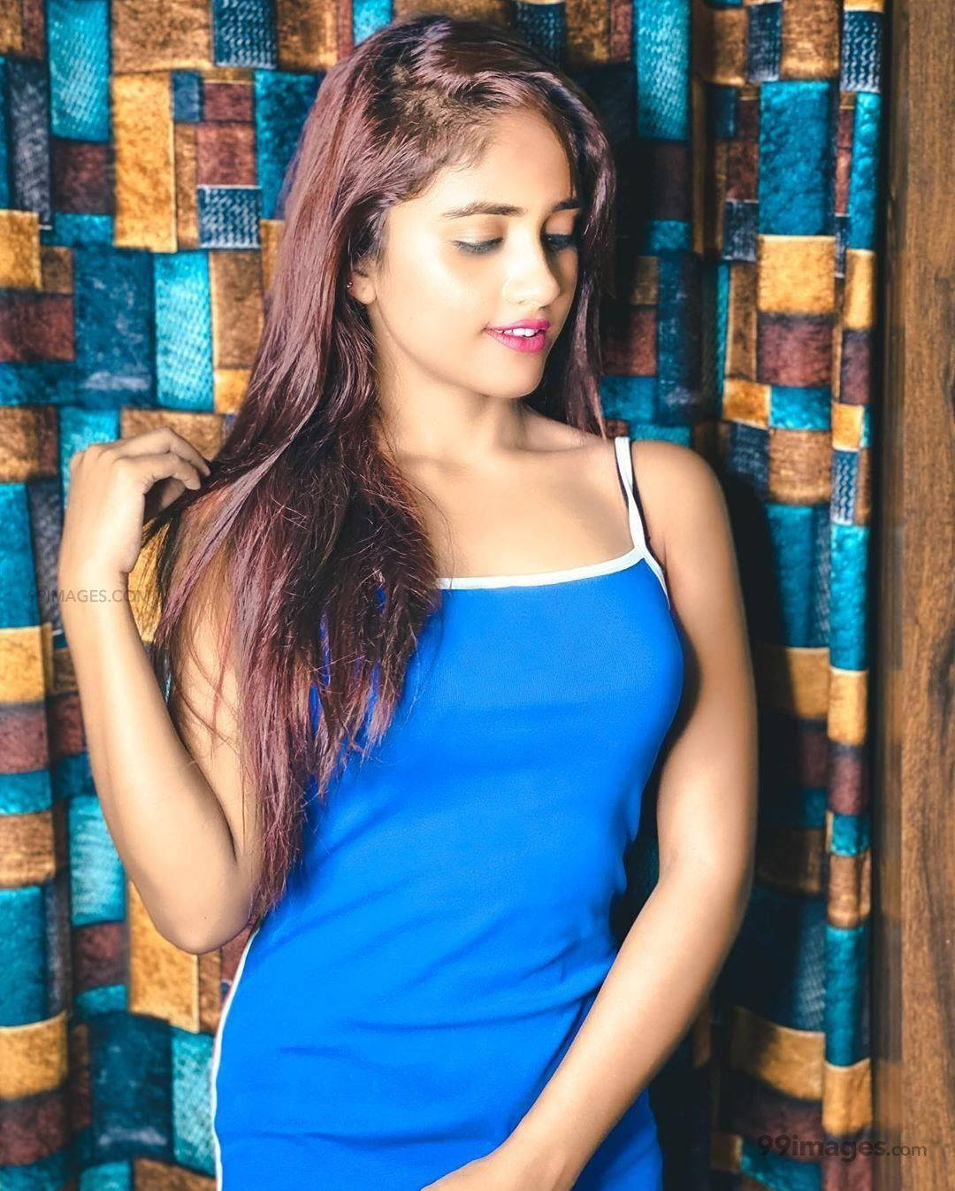 Download Nisha Guragain In Blue Sleeveless Top Wallpaper ...