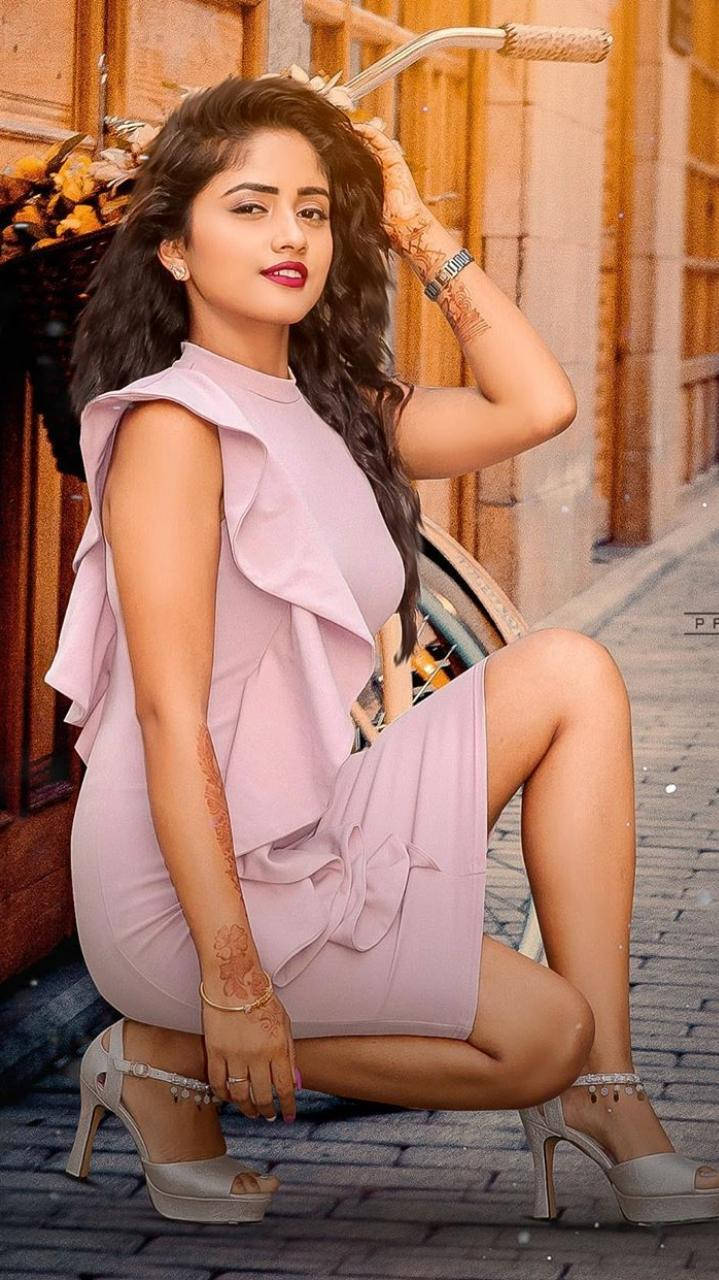 Download Nisha Guragain In Lavender Dress Wallpaper | Wallpapers.com