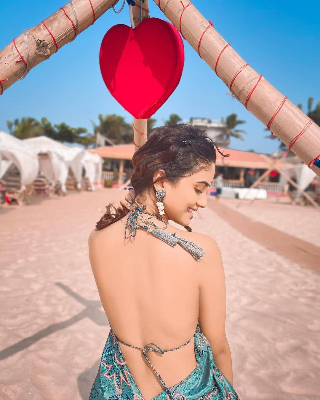 Nisha Guragain Posing Elegantly in Sand Wallpaper