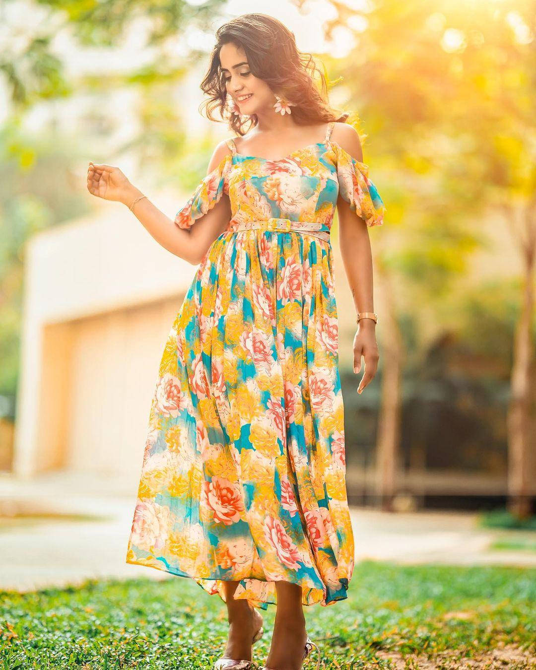 Nisha Guragain Captivating in Yellow Floral Dress Wallpaper