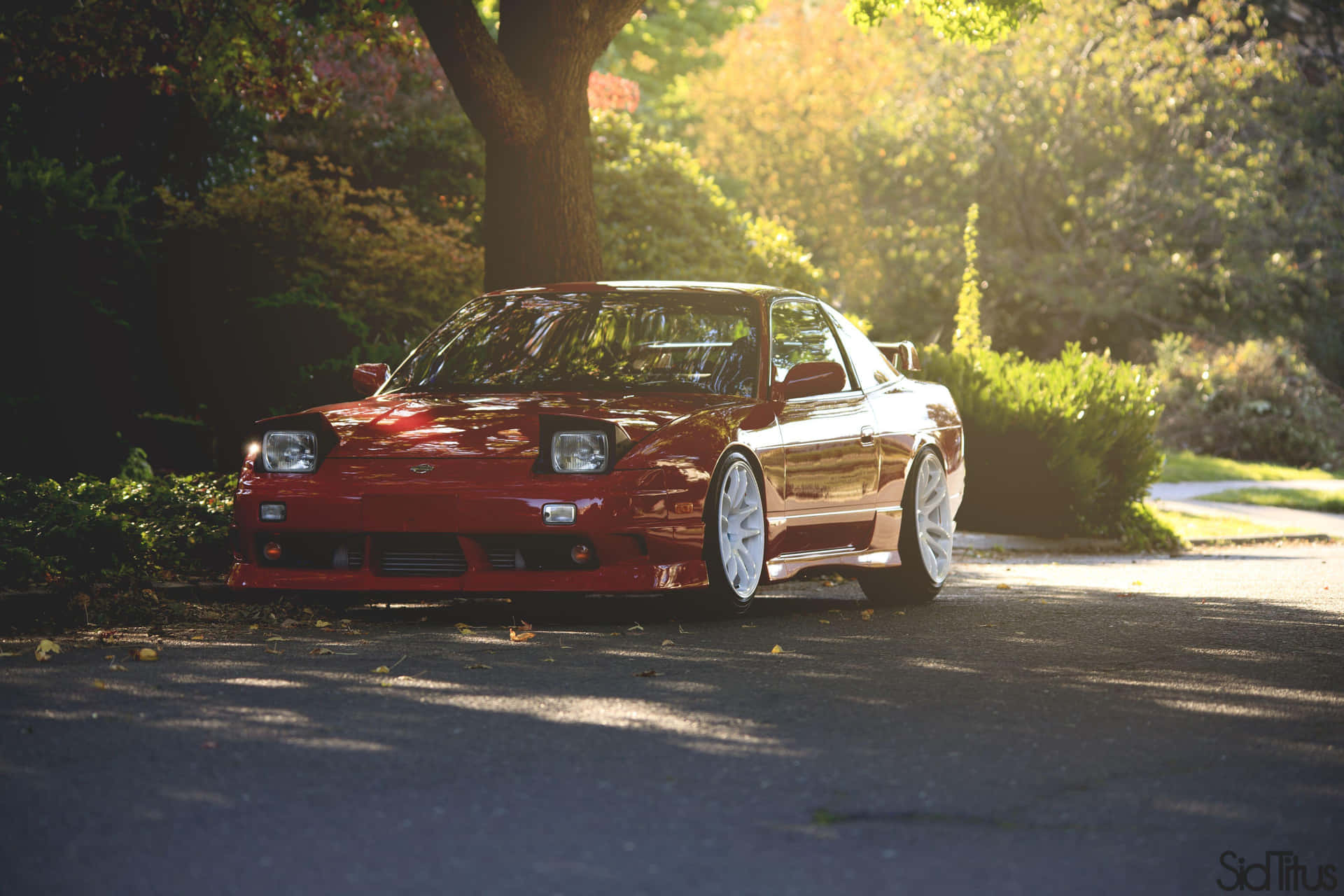 Classic Nissan 180SX Zooms Across the Streets Wallpaper