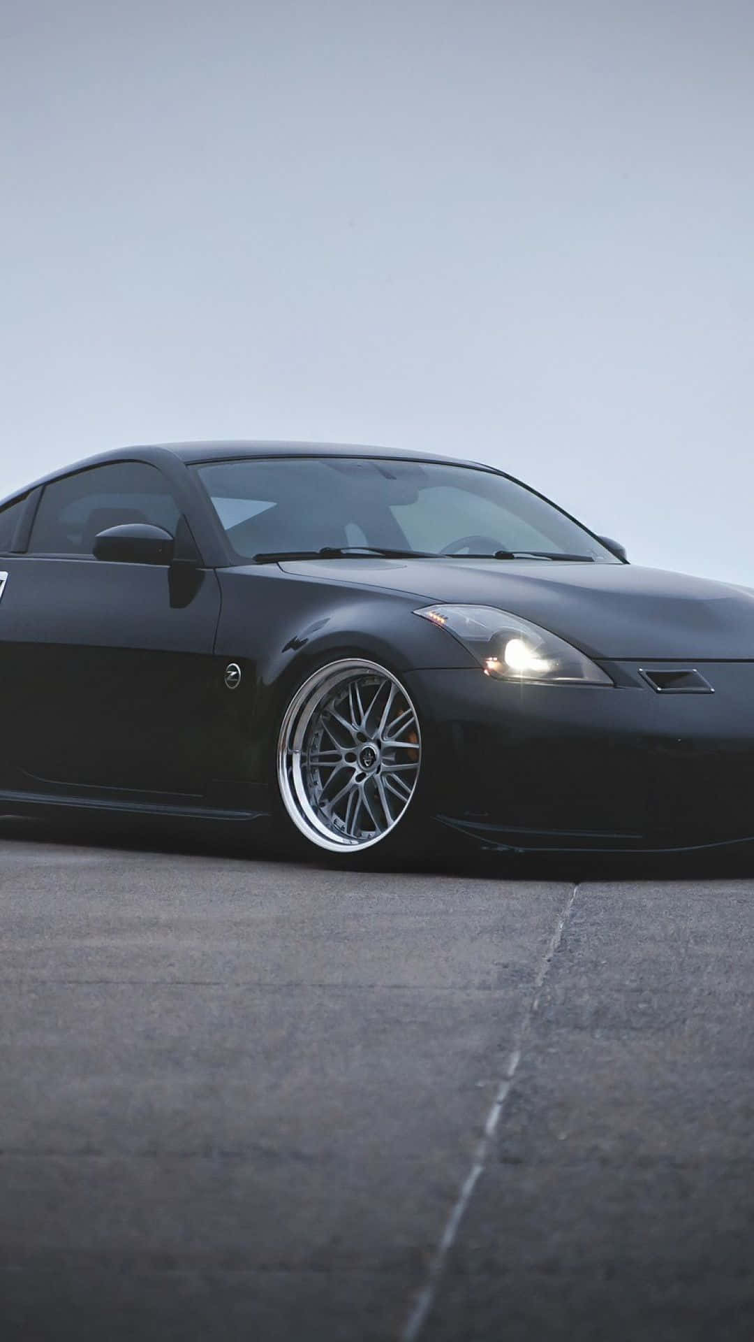 Enjoy the ride with the sleek and stylish Nissan 350Z Wallpaper