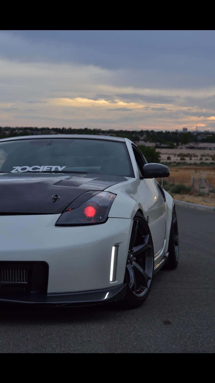 Capture the thrill of the open road in the Nissan 350z Wallpaper