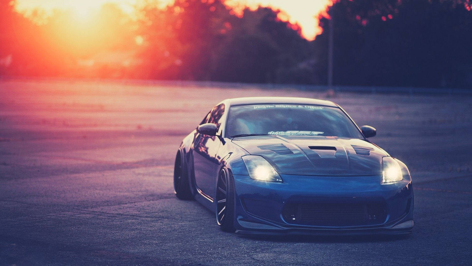 Enjoy the Thrill of the Open Road in a Nissan 350Z Wallpaper