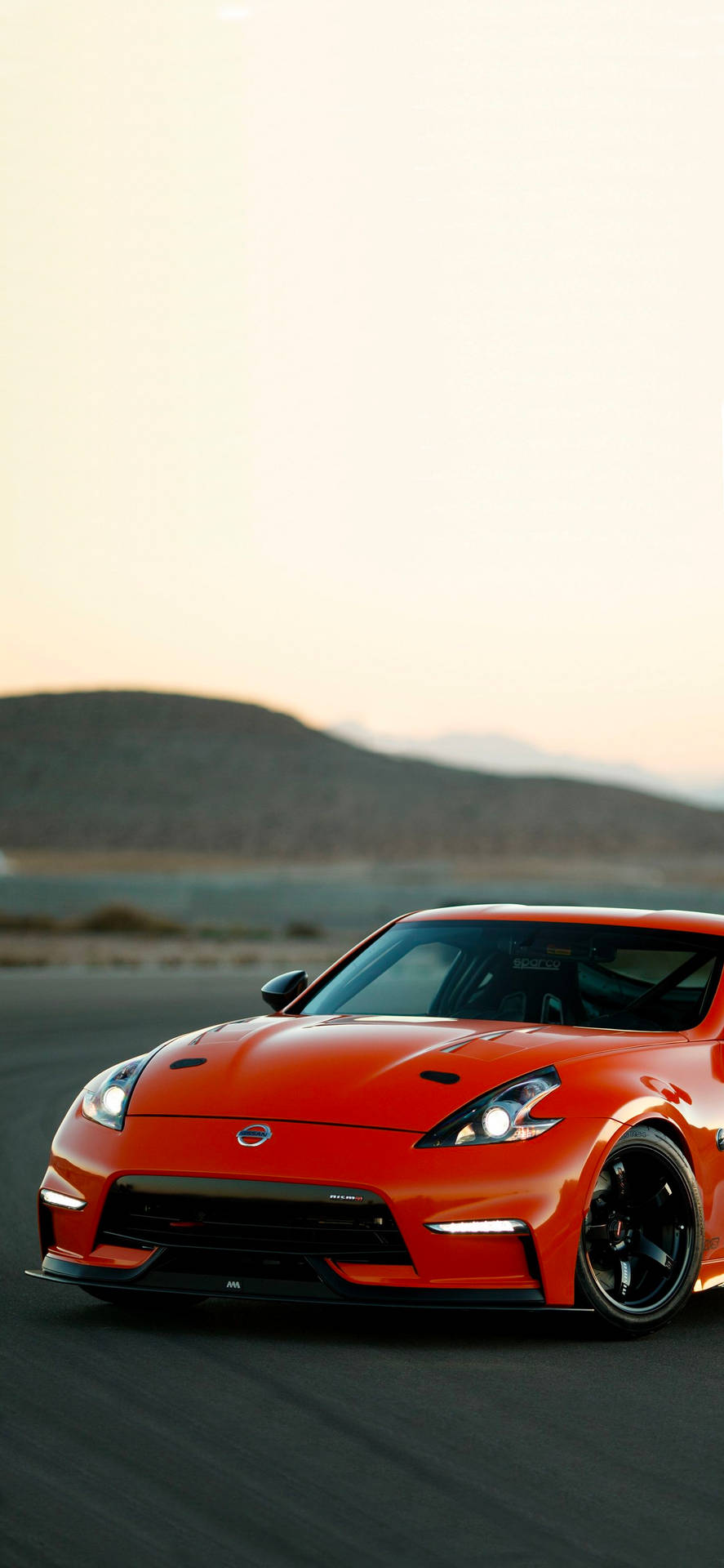 Red Nissan 370z With A Hill Wallpaper
