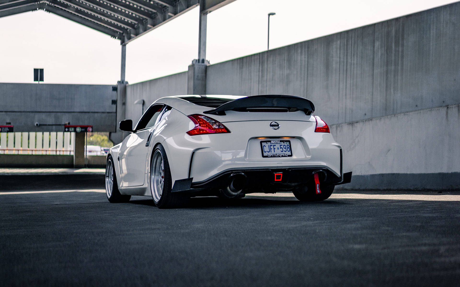 Nissan 370z At A Covered Parking Wallpaper