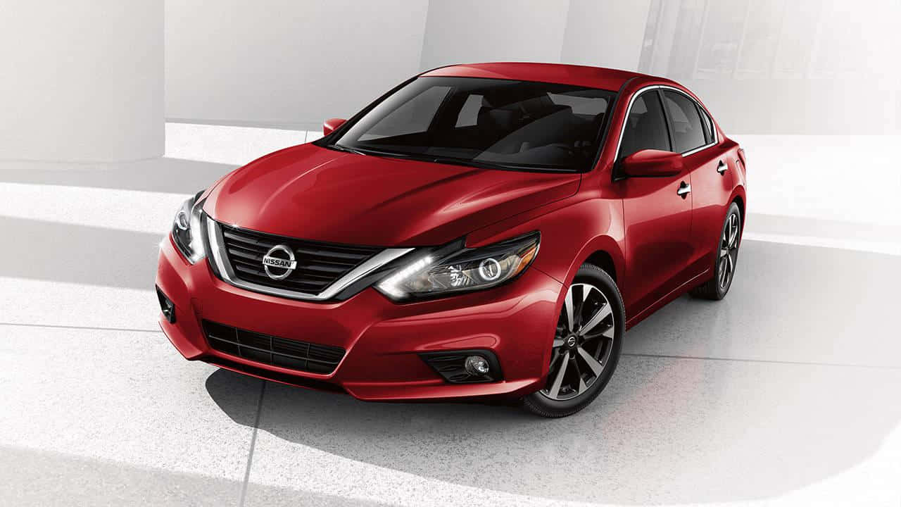 Striking Nissan Altima on the road Wallpaper