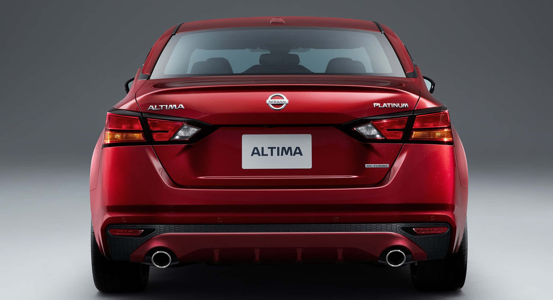 Caption: Sleek and Sophisticated Nissan Altima Wallpaper