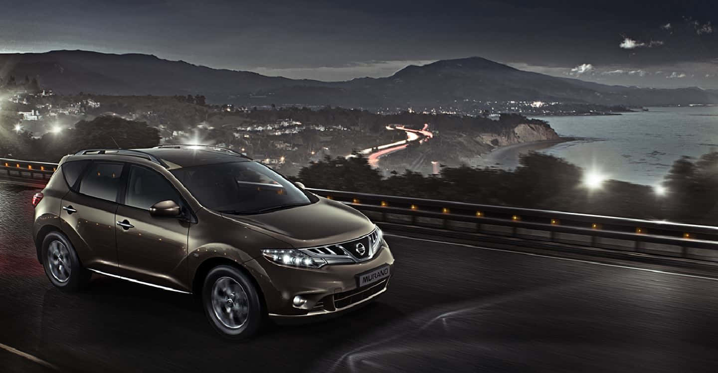 A stylish Nissan Murano SUV on the road Wallpaper
