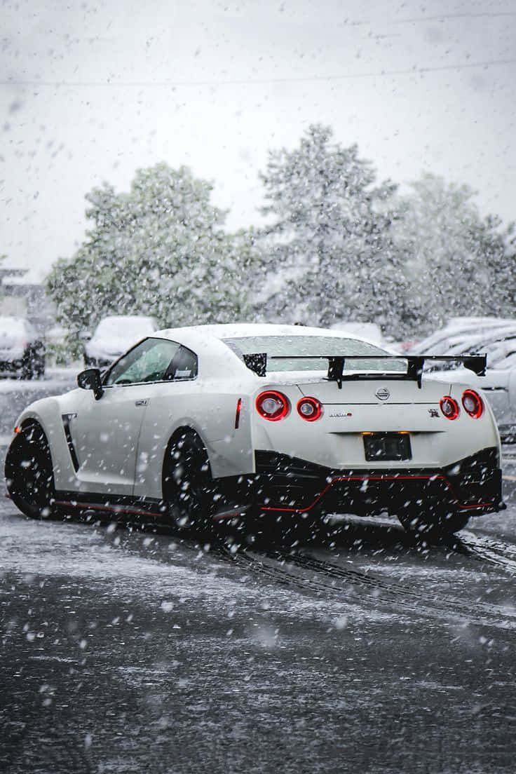 White Nissan R35 Gtr On Snow Picture