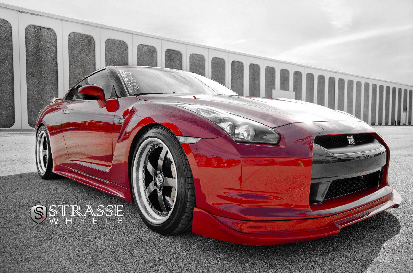Caption: Immaculate Nissan Skyline GT-R R35 in Stunning Red Wallpaper
