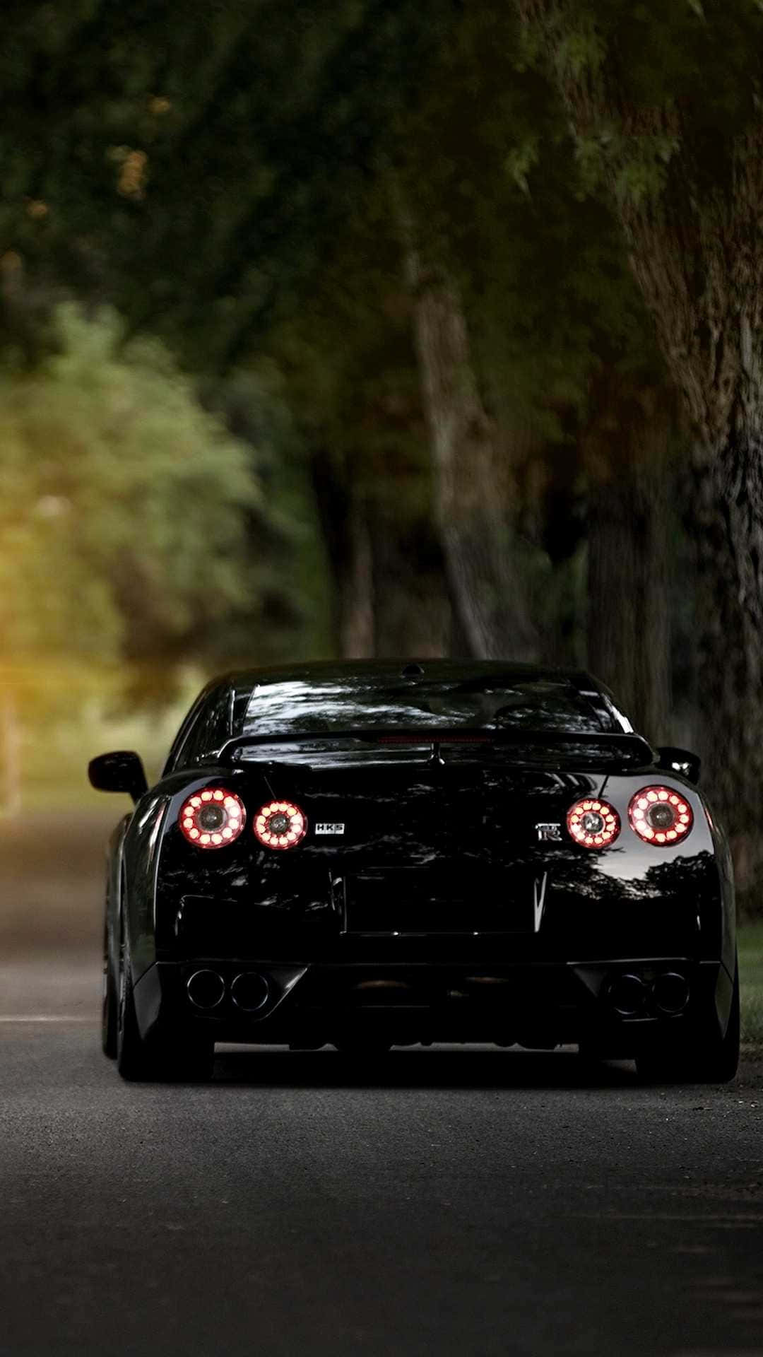 Unlock The Cool: Nissan Skyline For Your Iphone Wallpaper