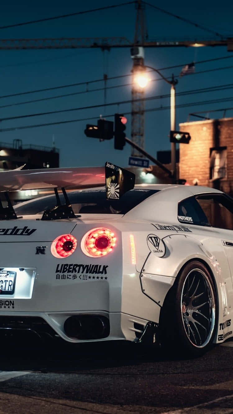Enjoy life in style with the Nissan Skyline for iPhone Wallpaper