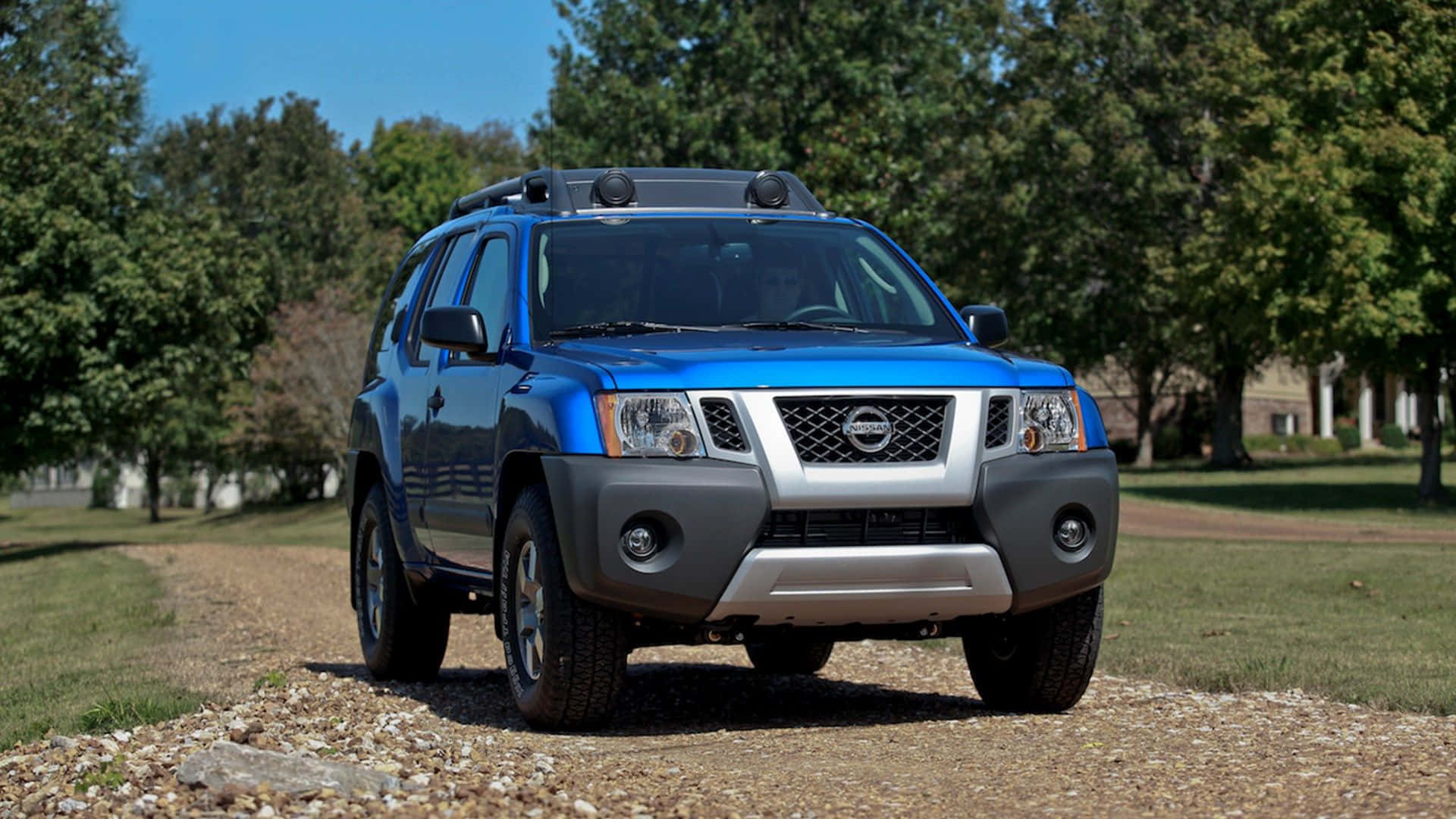 Nissan Xterra Trekking Through The Wilderness Wallpaper