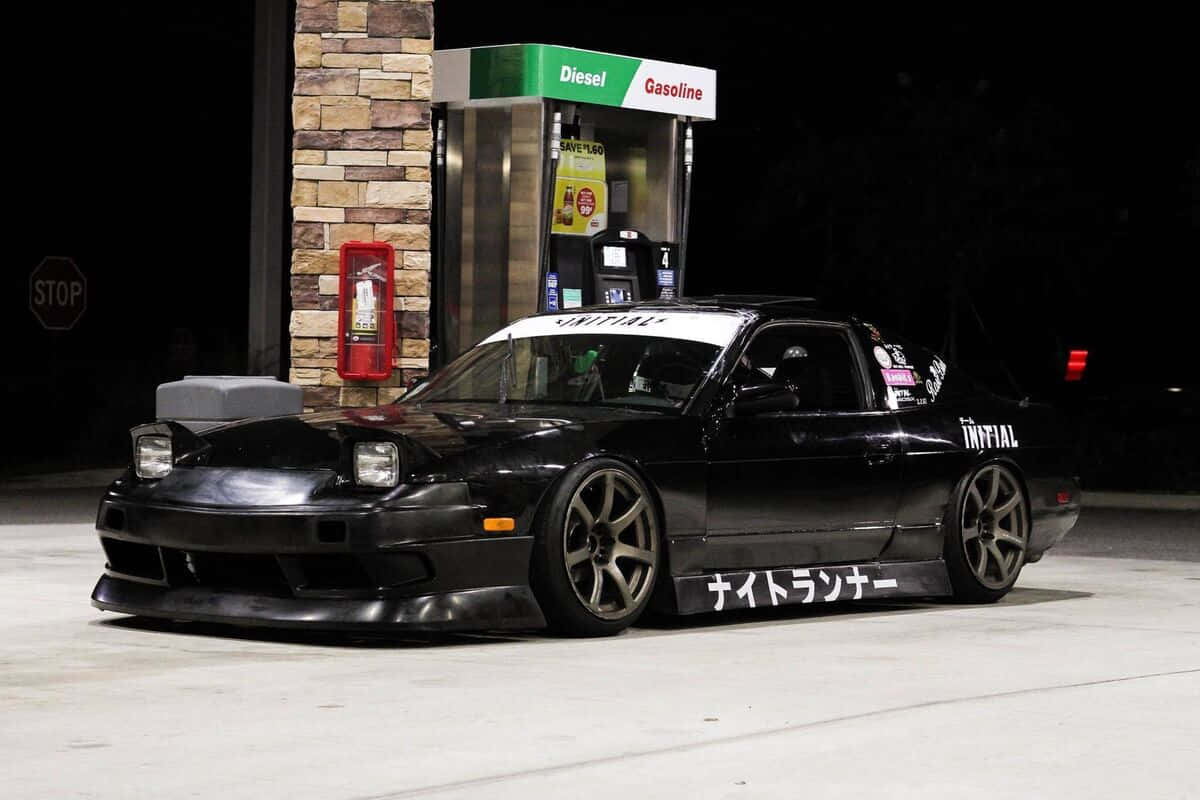 Nissan240sx Modifiedat Gas Station Night Wallpaper