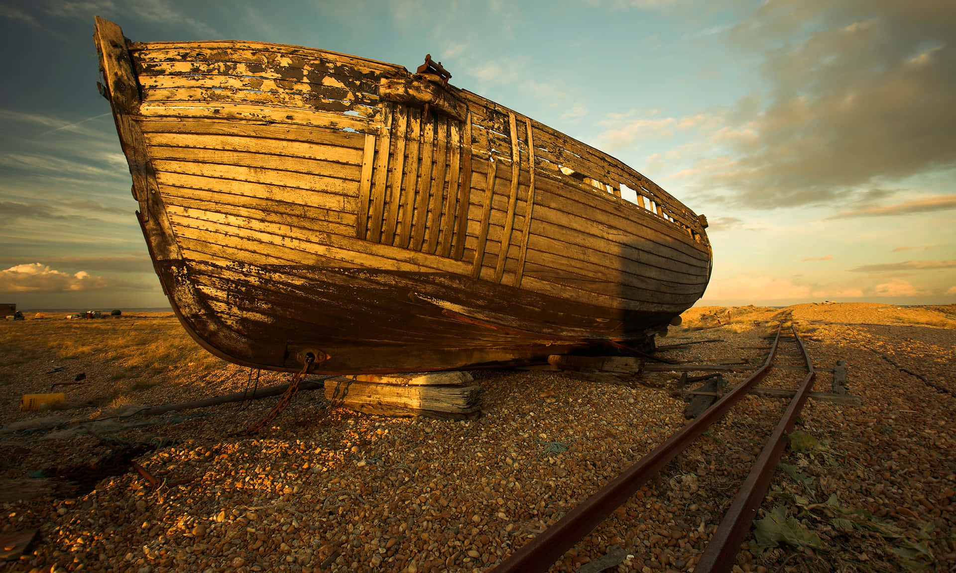 A Wooden Boat On The Tracks
