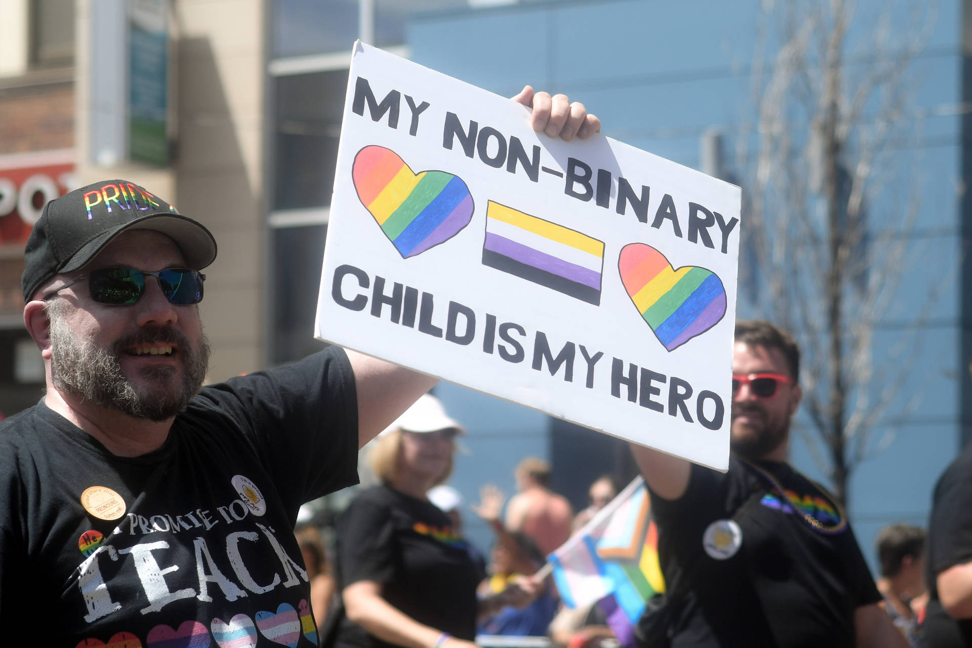 Non-binary Father In Protest Wallpaper